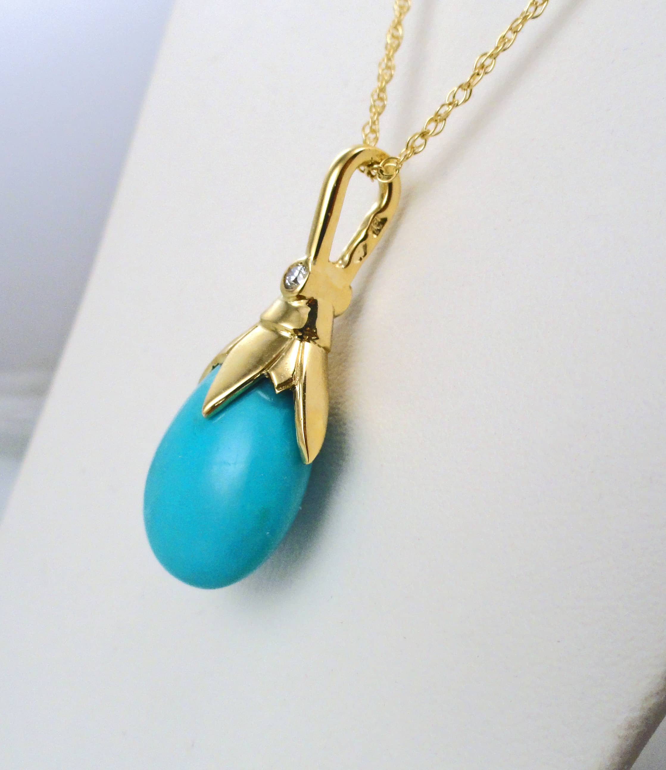 Hand Carved Turquoise Teardrop Pendant P Summit Jewelers